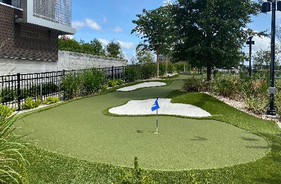 Commercial artificial putting green