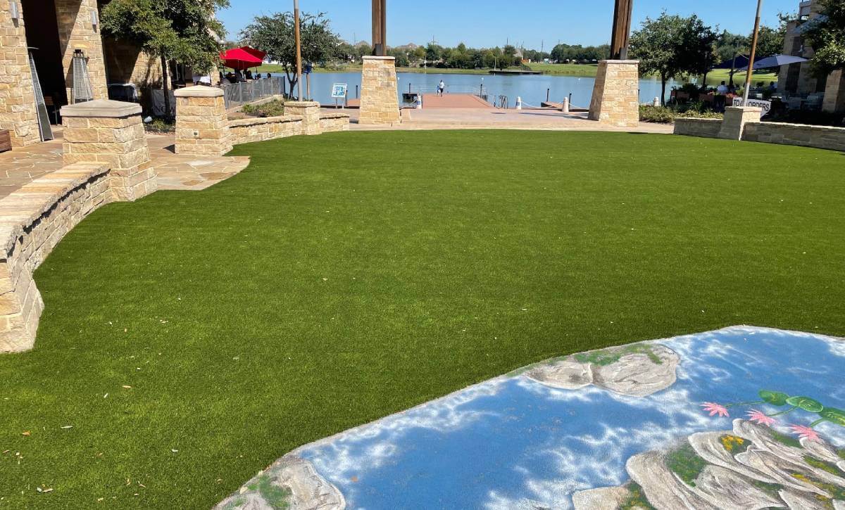 Lake side view from the boardwalk towne lake artificial grass project