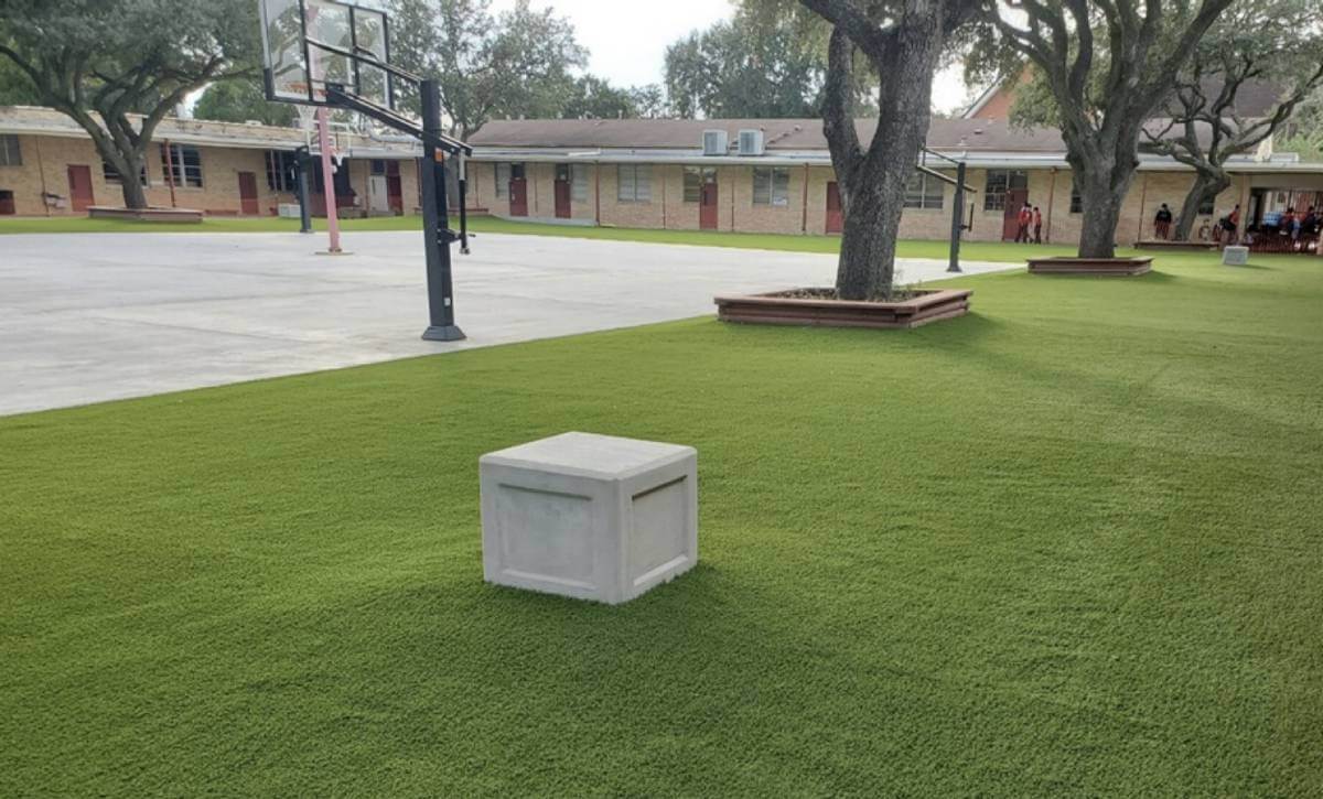 Completed shot of the artificial grass project at holy ghost catholic school