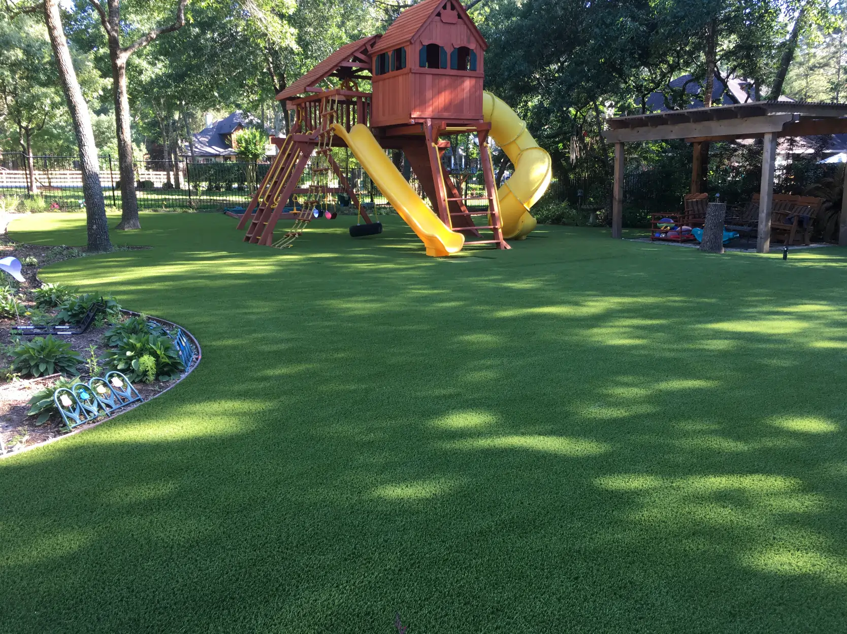 20210616_180949000_iOS residential mississippi playground turf